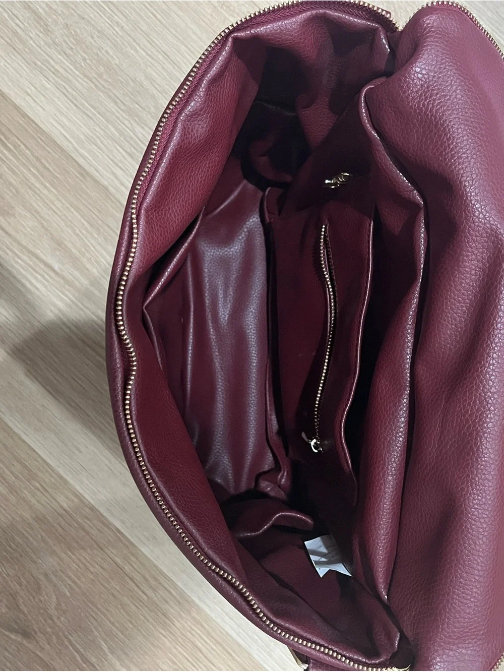 Fawn Design Burgundy Pebbled Faux Leather Backpack